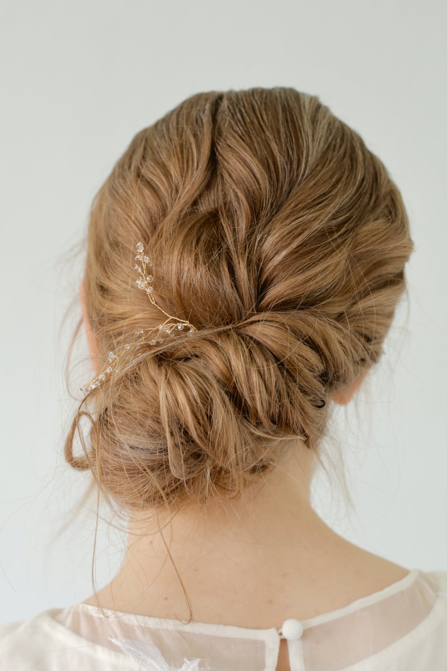 Gold hair vine for wedding hairstyle