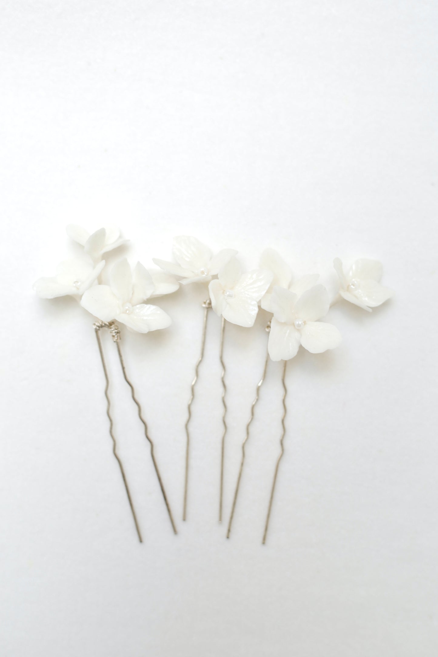 Wedding headwear for bride with white flowers