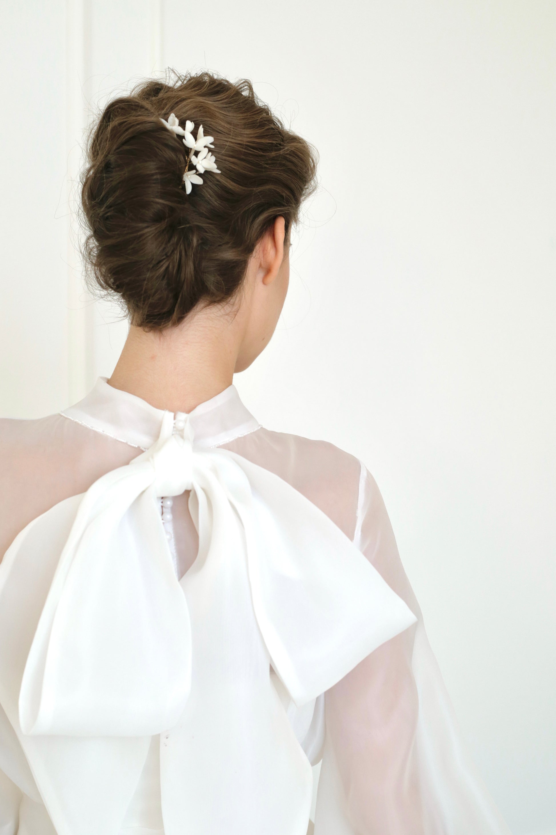 headpiece with flowers for bridal hairstyle