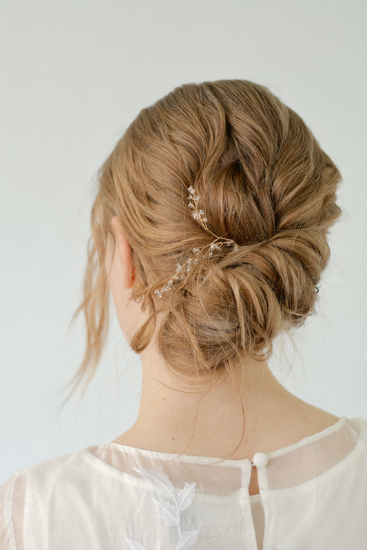 Beaded wedding headpiece for bridal hairstyle