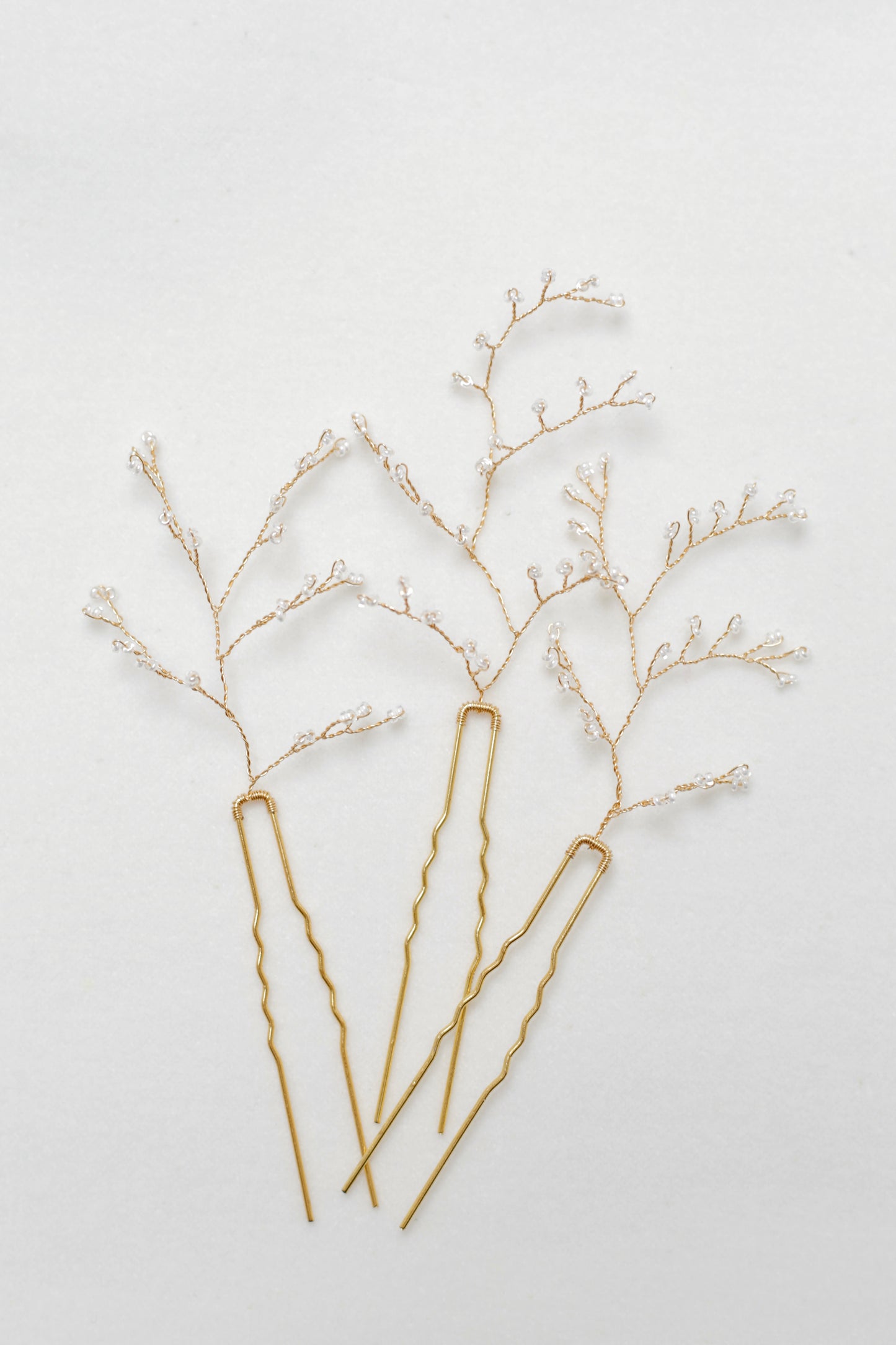 Beaded hair pieces for bride