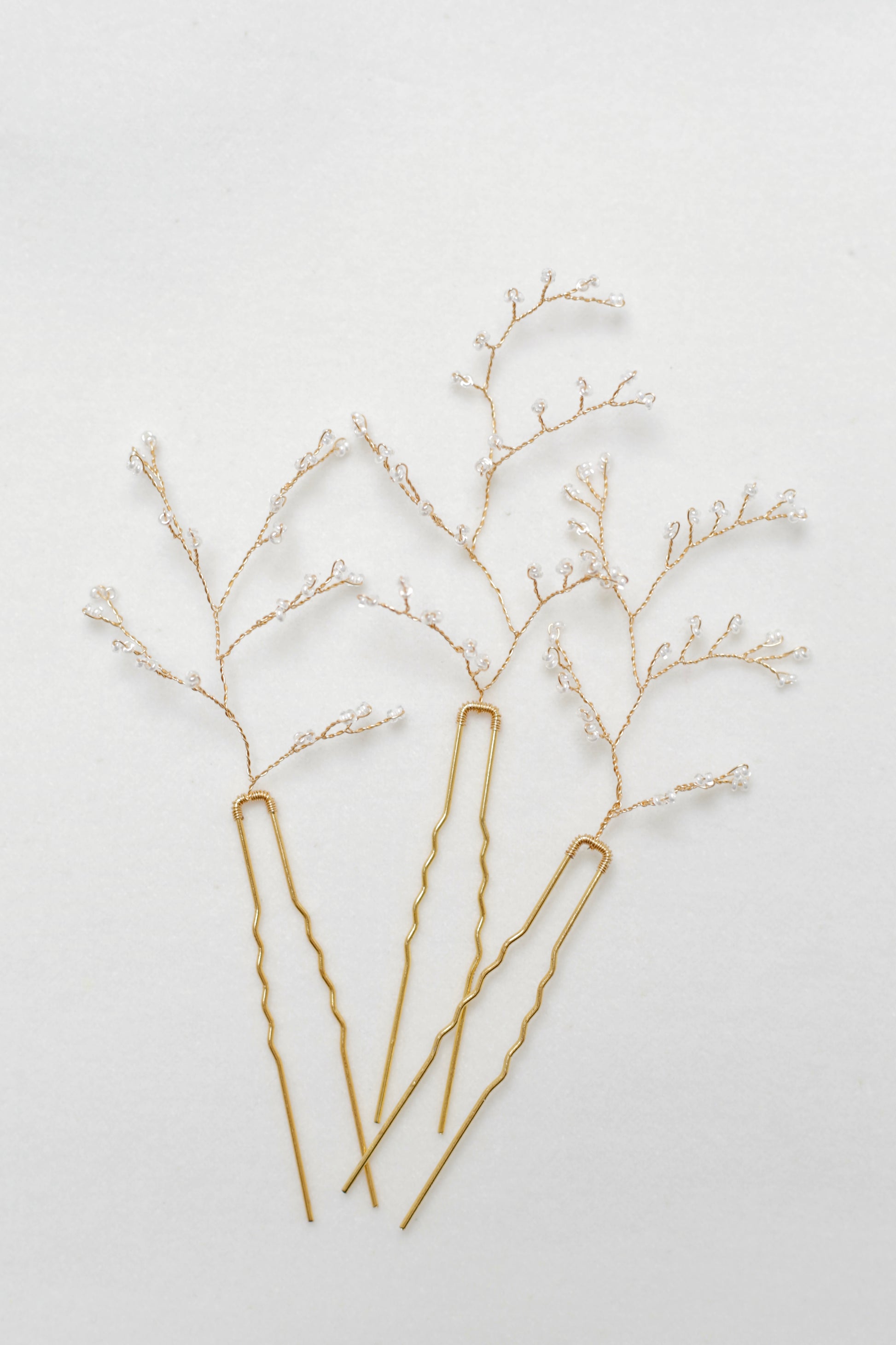 Beaded hair pieces for bride