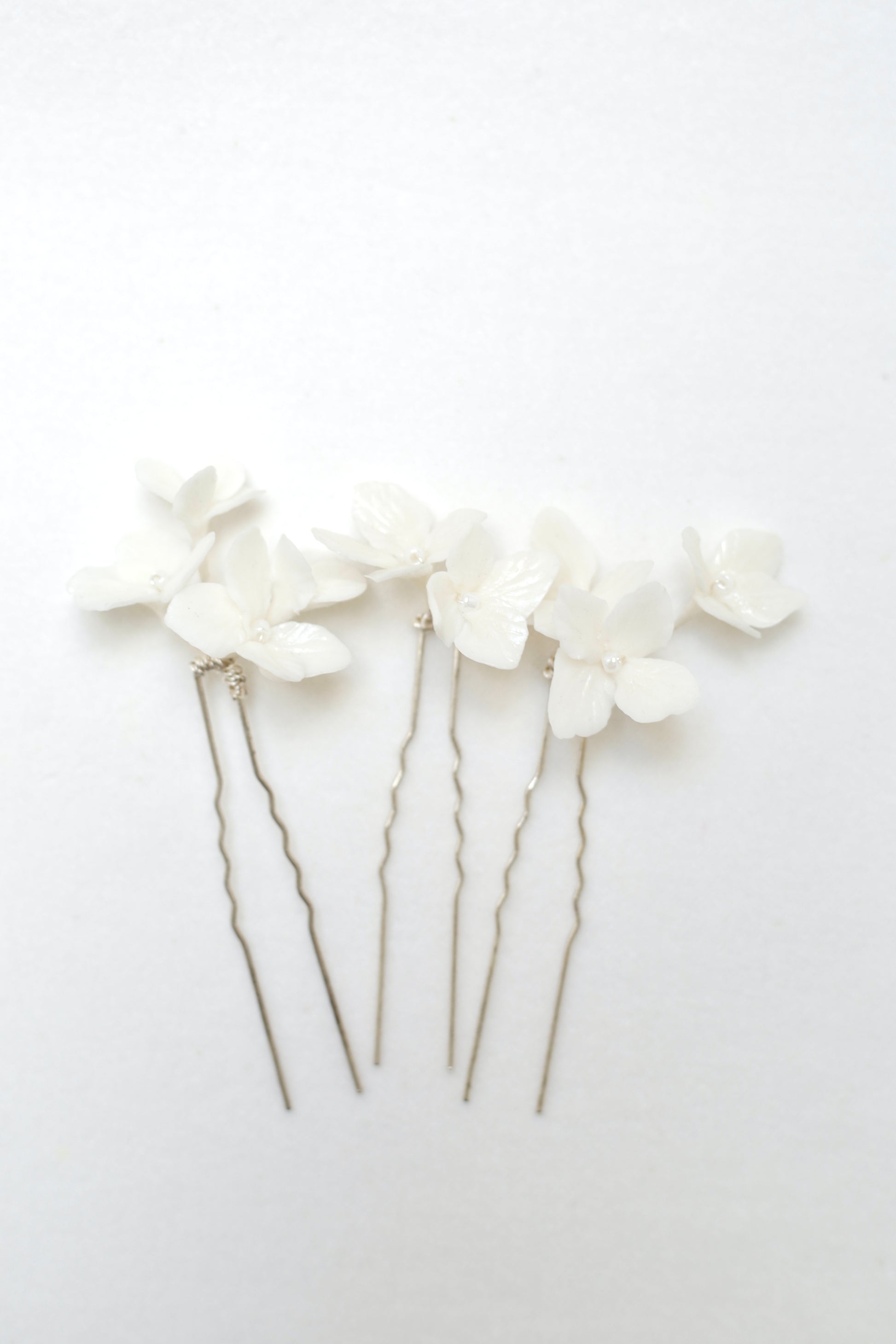 Wedding headwear for bride with white flowers